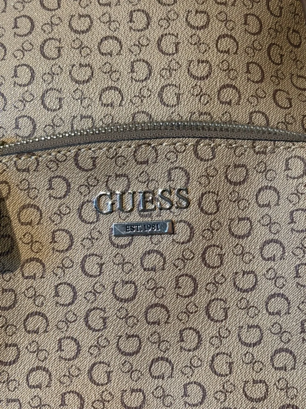 Guess Tan Monogram Mini Backpack